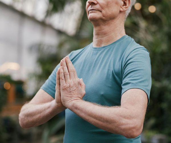 Man meditating peacefully after a workout session.